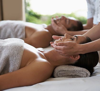 Couple massage for two in a shared treatment room