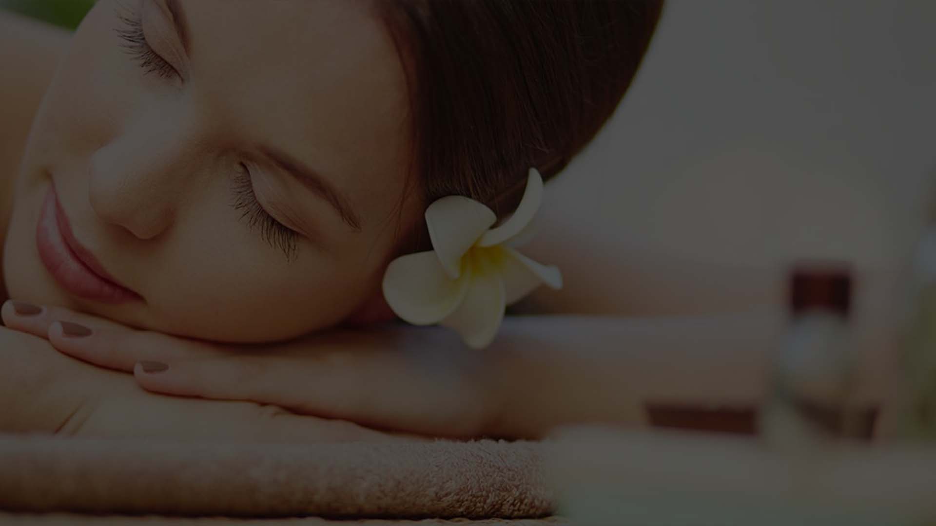 Close-up of a woman relaxing face down during a massage
